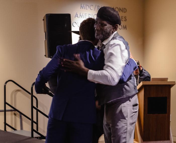 An emotional embrace while honoring a community partner at the 2023 gala